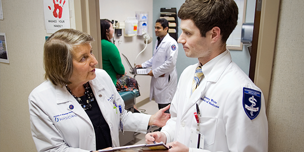 Beebe advising medical student Jeremy White in 2012